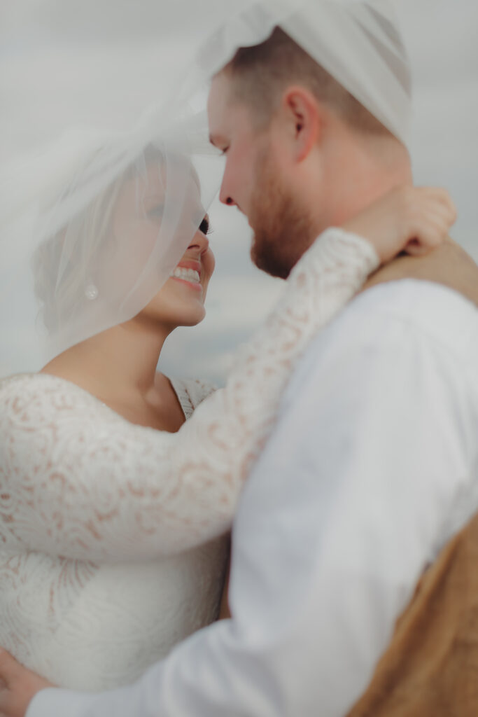 Bride and groom photographed by wedding photographer in Bismarck and Fargo, Marlee Kruger